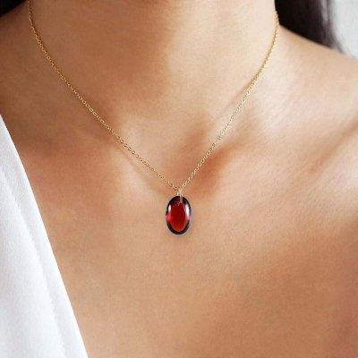 Pendentif en or jaune et Grenat