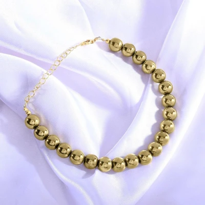 Bracelet en plaqué or et perles de pyrite dorée