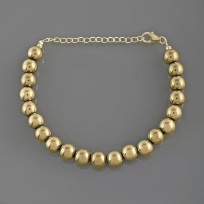 Bracelet en plaqué or et perles de pyrite dorée
