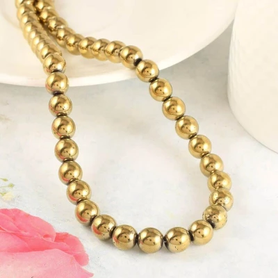 Collier en perles de pyrite dorée