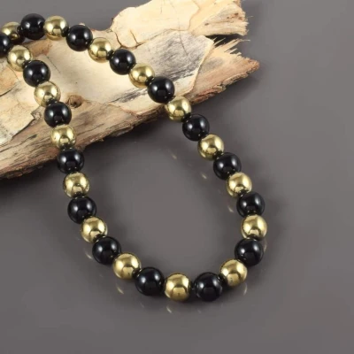 Collier en pyrite dorée et tourmaline noire
