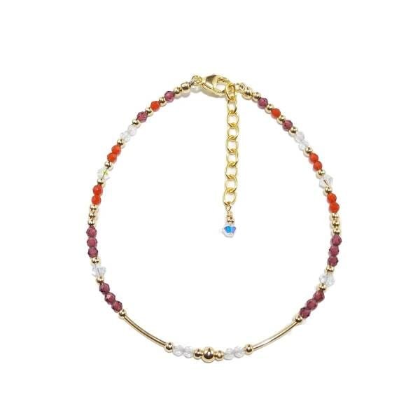 Bracelet en or avec cristal de roche, cornaline et grenat