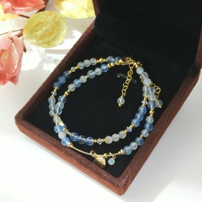 Bracelet en or avec aigue-marine et pierre de lune