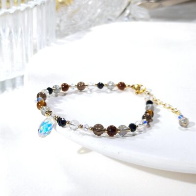Bracelet en or oeil de tigre, labradorite, tourmaline et quartz
