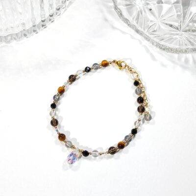 Bracelet en or oeil de tigre, labradorite, tourmaline et quartz